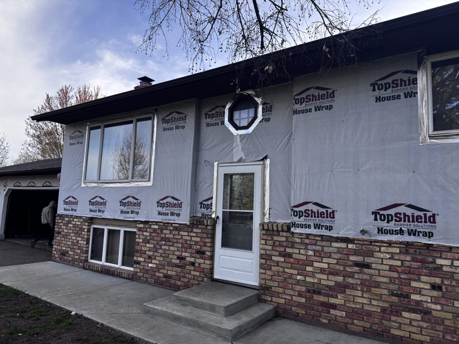Jacobs Construction house wrap preparation for siding installation in Ham Lake Minnesota